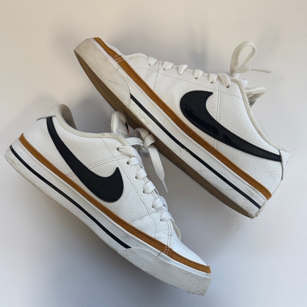Nike Court Legacy Womens White Sneakers with Black Swoosh and Brown Stripe